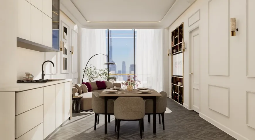 Light-filled kitchen, dining and living space at FAUCHON Residences with a Dubai skyline view