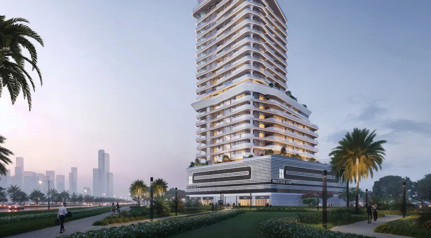 Sanctuary Hive tower at Meydan Horizon at dusk, with the podium office lobby and landscaped park in the foreground