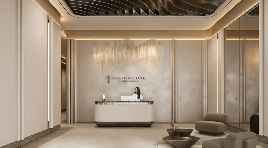 Grand office lobby at Sanctuary Hive with sculpted timber ceiling, stone reception desk and a seating lounge